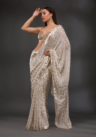 koskii-offwhite-sequins-georgette-designer-saree-saus0032539_offwhite_1_7_large.jpg